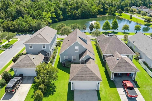 aerial view with a residential view and a water view