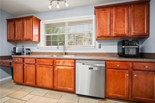 kitchen with dishwasher and sink