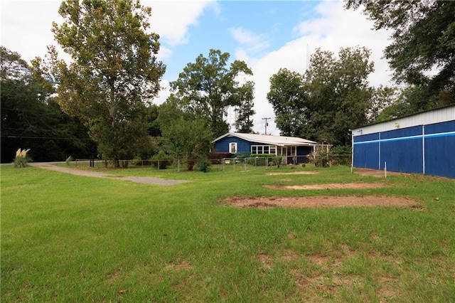view of yard with fence