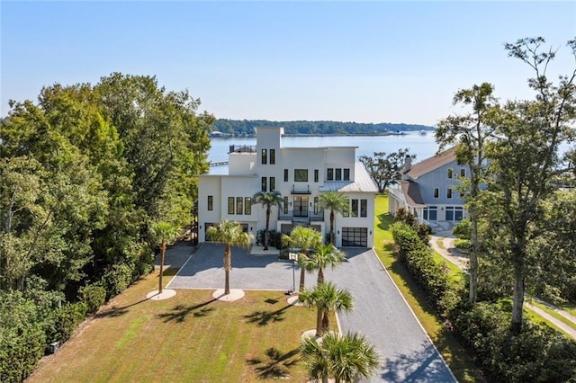 birds eye view of property featuring a water view