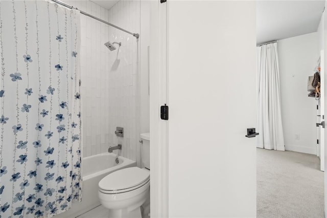 bathroom featuring shower / tub combo with curtain and toilet