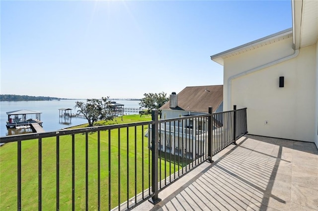 balcony featuring a water view