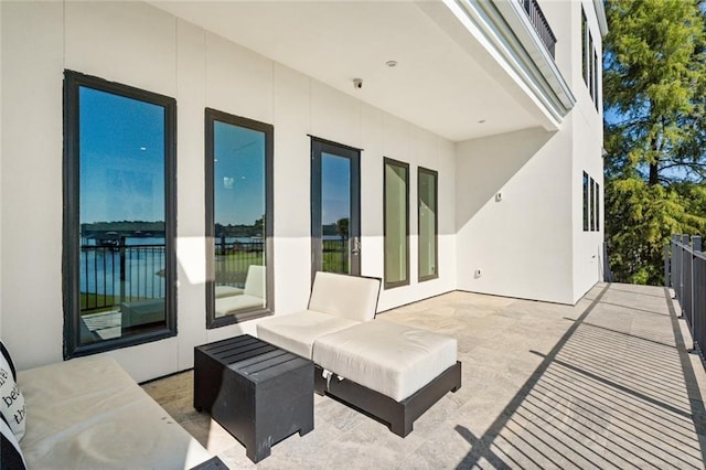 view of patio with a balcony