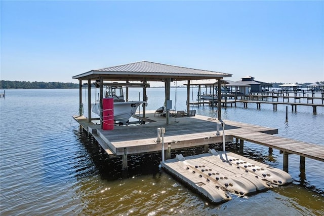 dock area featuring a water view