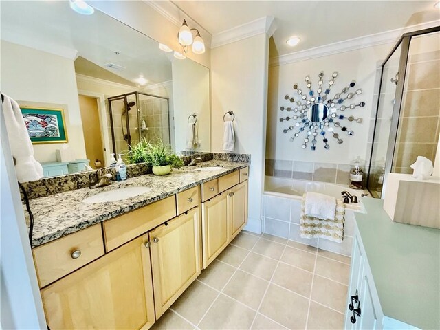 1601 Bienville Blvd Unit 316, Dauphin Island, AL 36528 - full bathroom with a shower stall, tile patterned floors, a sink, and ornamental molding