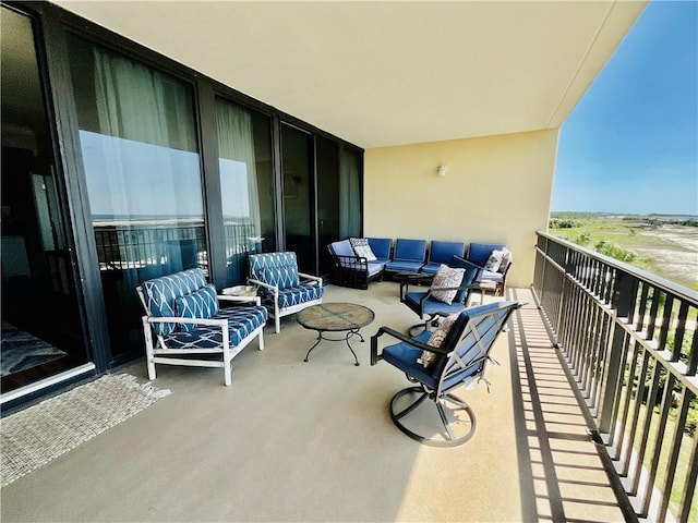 1601 Bienville Blvd Unit 316, Dauphin Island, AL 36528 - balcony featuring outdoor lounge area