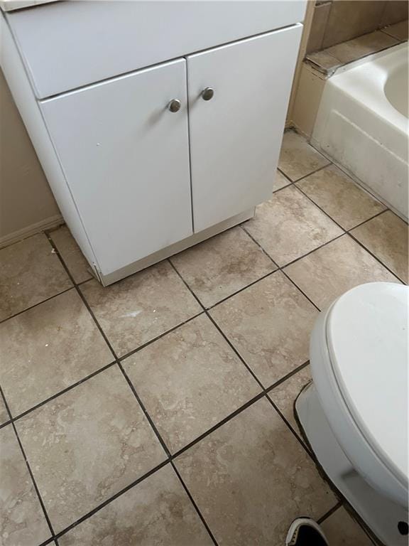 interior details with toilet and a tub