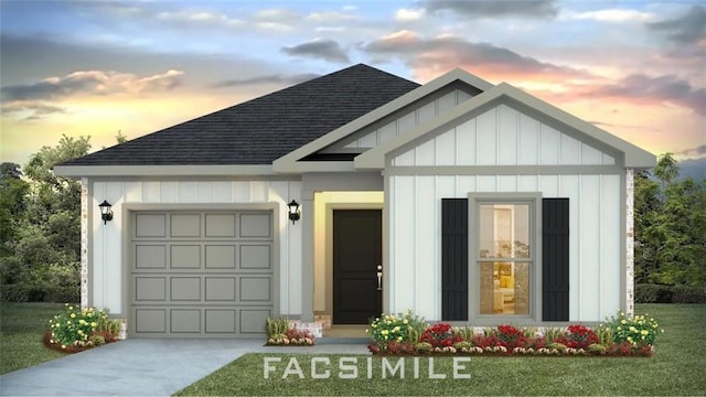 1249 Legacy Rd, Mobile, AL 36608 - view of front of house with a shingled roof, board and batten siding, concrete driveway, an attached garage, and a front yard