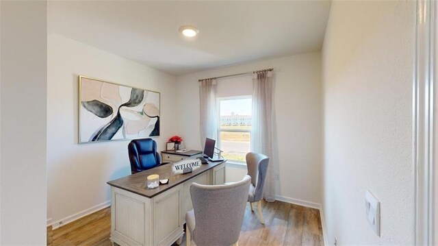 1249 Legacy Rd, Mobile, AL 36608 - office area with light wood-style floors and baseboards