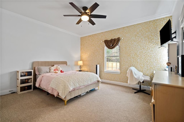 carpeted bedroom featuring ceiling fan and ornamental molding