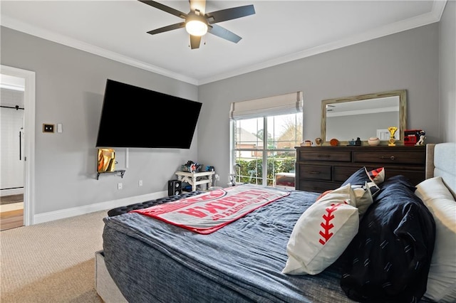 bedroom with crown molding, ceiling fan, and carpet floors