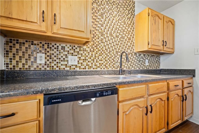 kitchen with dishwasher, dark wood-type flooring, sink, and tasteful backsplash