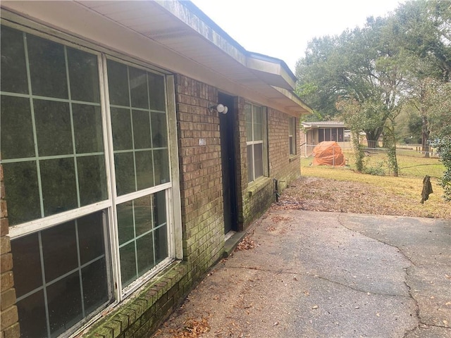 view of home's exterior featuring a patio