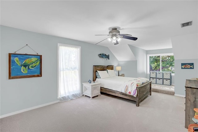 23749 Main St, Fairhope, AL 36532 - bedroom with light carpet, ceiling fan, and baseboards