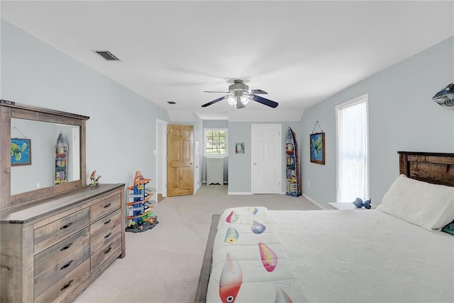 23749 Main St, Fairhope, AL 36532 - bedroom featuring light carpet, baseboards, and ceiling fan