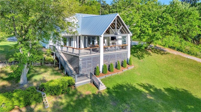 23749 Main St, Fairhope, AL 36532 - back of property with a yard and metal roof
