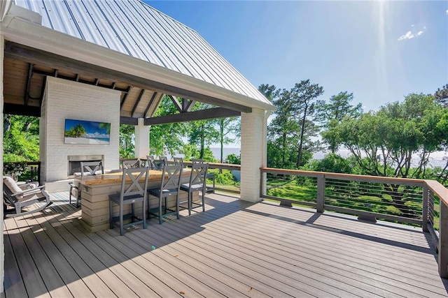 23749 Main St, Fairhope, AL 36532 - wooden terrace featuring a multi sided fireplace