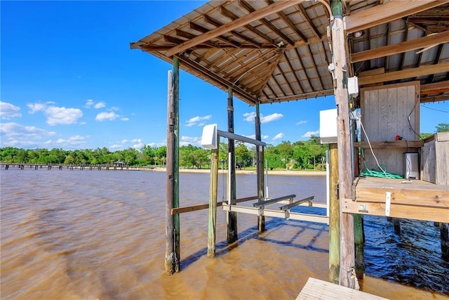 23749 Main St, Fairhope, AL 36532 - dock featuring boat lift and a water view