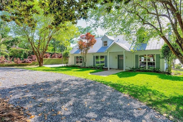 23749 Main St, Fairhope, AL 36532 - cape cod house with a front yard
