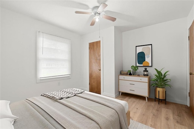 1208 Creekway Dr, Mobile, AL 36605 - bedroom featuring light wood finished floors, ceiling fan, and baseboards