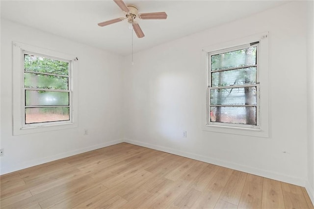 1208 Creekway Dr, Mobile, AL 36605 - empty room with light wood-type flooring, baseboards, and a ceiling fan