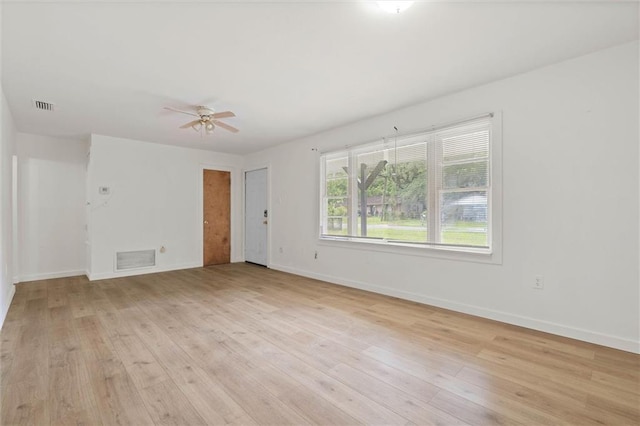 1208 Creekway Dr, Mobile, AL 36605 - unfurnished living room featuring light wood finished floors, baseboards, and a ceiling fan