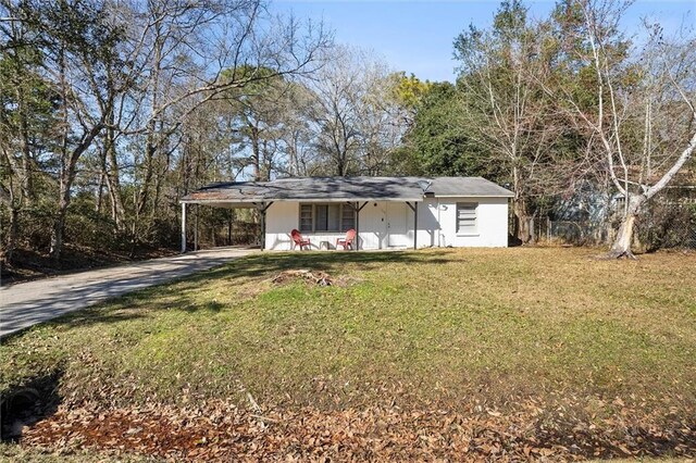 1208 Creekway Dr, Mobile, AL 36605 - view of front of property featuring driveway, a carport, a front lawn, and covered porch