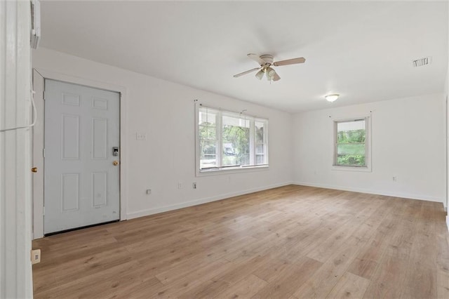 1208 Creekway Dr, Mobile, AL 36605 - spare room with a ceiling fan, light wood-style floors, and baseboards