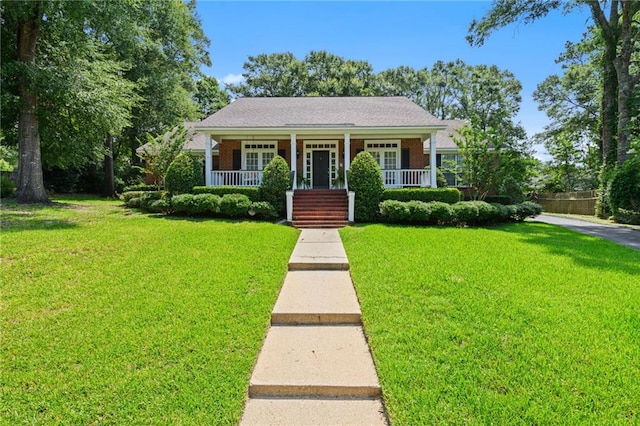 1525 Beacon Ct, Mobile, AL 36695 - view of front of home featuring a front yard and a porch