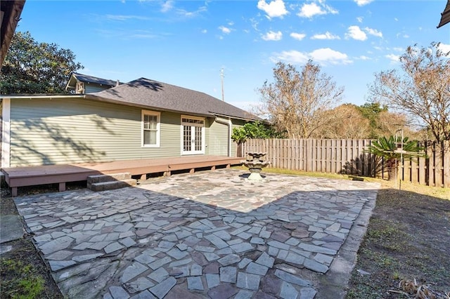 view of patio with a wooden deck and french doors