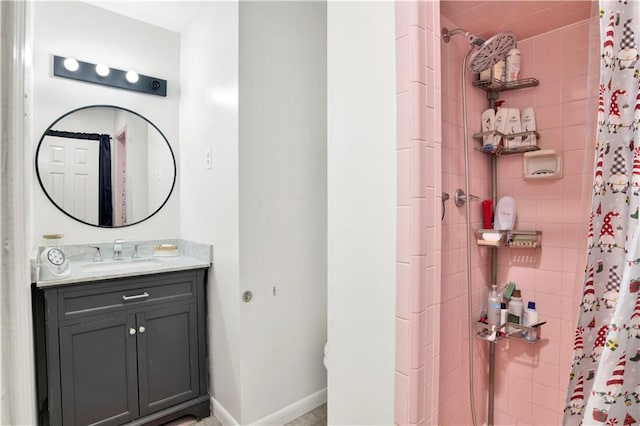 bathroom with vanity and walk in shower