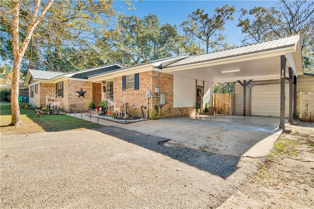 ranch-style home with a carport