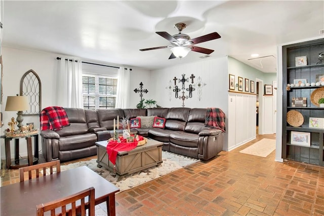 living room featuring ceiling fan