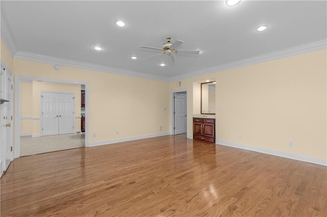 1140 Dominion Dr E, Mobile, AL 36695 - unfurnished living room featuring crown molding, a ceiling fan, light wood-type flooring, and recessed lighting