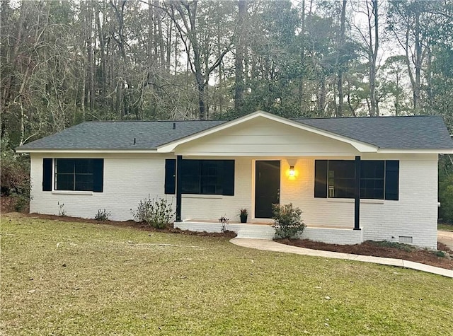 single story home with crawl space, brick siding, a porch, and a front lawn