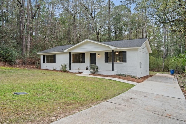 ranch-style home featuring crawl space, a porch, a front yard, and brick siding