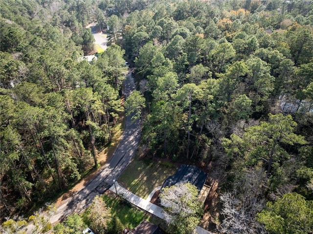 bird's eye view featuring a view of trees