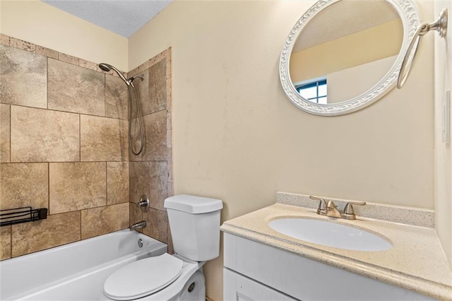 bathroom with toilet, bathtub / shower combination, a textured ceiling, and vanity