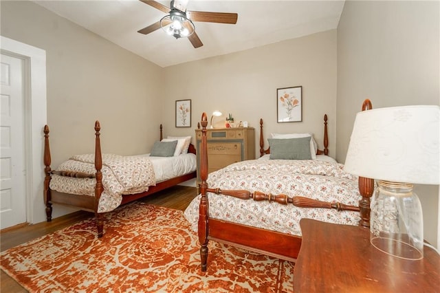 bedroom with wood-type flooring and ceiling fan