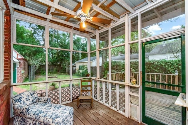 sunroom / solarium with ceiling fan