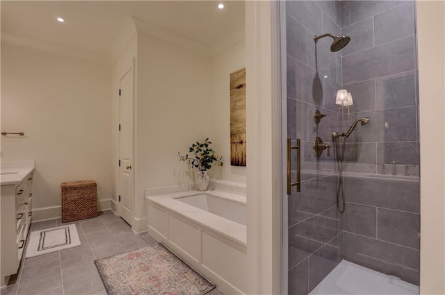 bathroom with crown molding, tile patterned flooring, vanity, and tiled shower