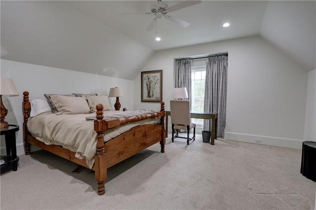 carpeted bedroom with ceiling fan and lofted ceiling