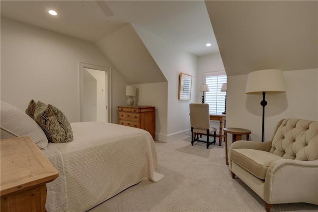 carpeted bedroom with ceiling fan and lofted ceiling