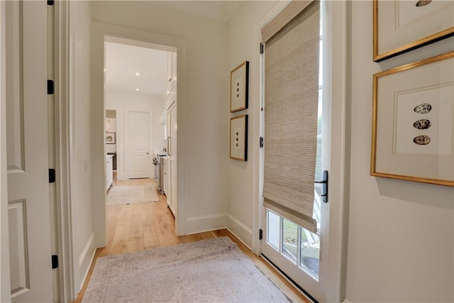 corridor featuring light wood-type flooring