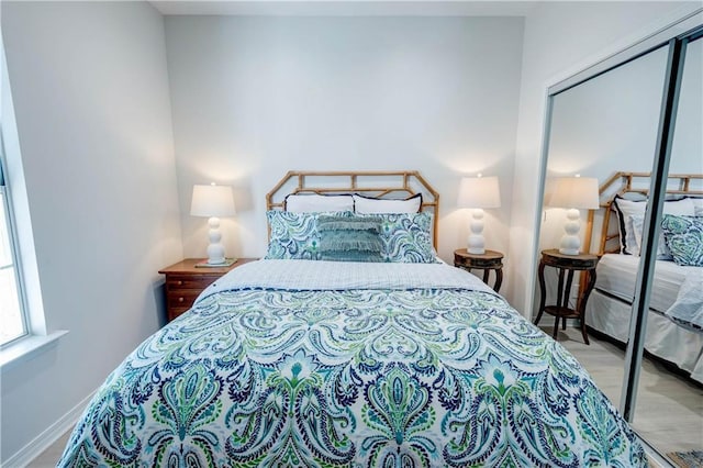 3150 State Highway 180, Gulf Shores, AL 36571 - bedroom featuring a closet and wood finished floors
