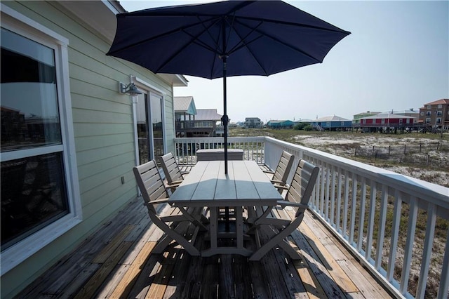 3150 State Highway 180, Gulf Shores, AL 36571 - wooden terrace with outdoor dining space