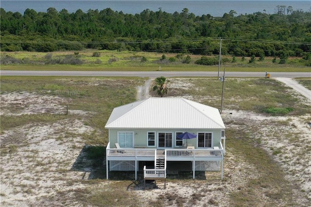 3150 State Highway 180, Gulf Shores, AL 36571 - dock area featuring a wooded view and a deck with water view
