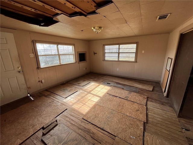 spare room with plenty of natural light