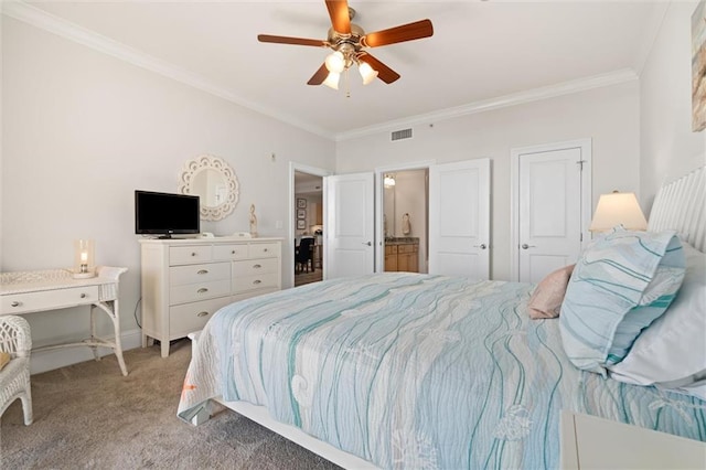 carpeted bedroom featuring crown molding and ceiling fan