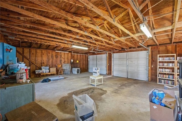 garage with wood walls